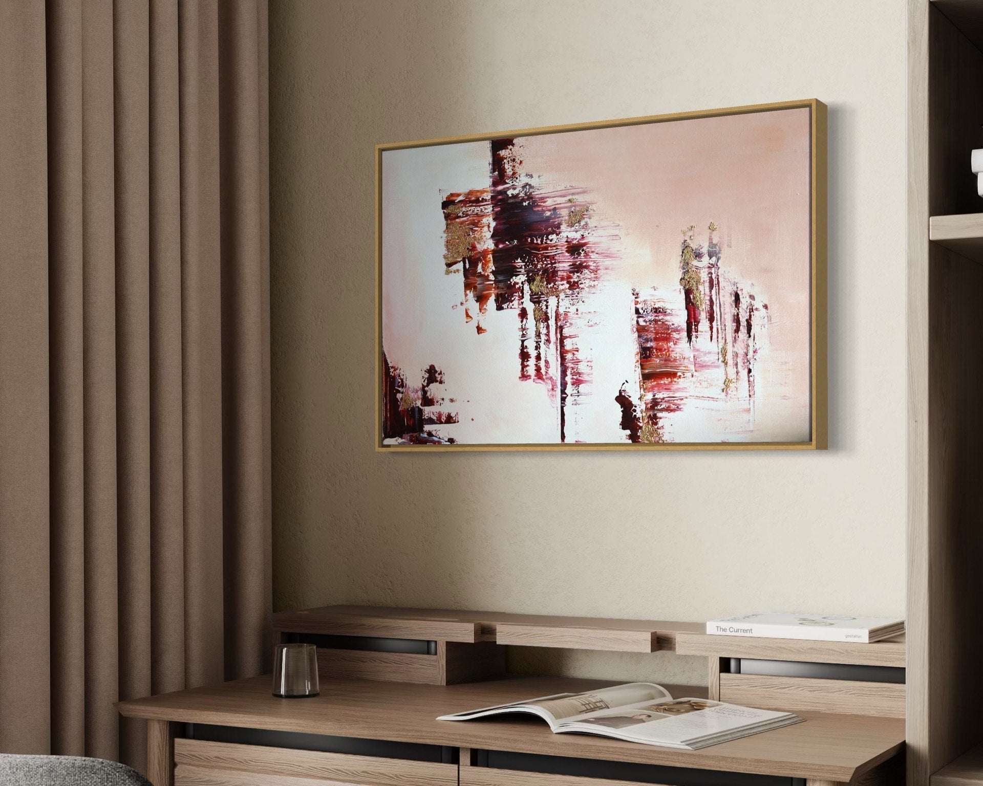 Modern home office with wooden desk, gray chair, and abstract art on the wall.
